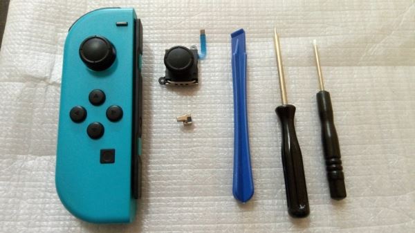 Подробная инструкция по замене стиков и фиксаторов на «джойконах» Nintendo Switch